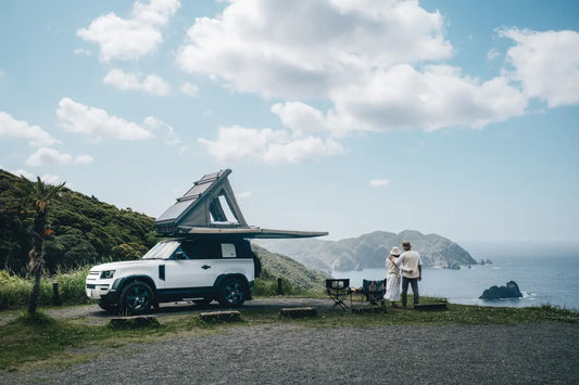 Couple camping on an overland trail
