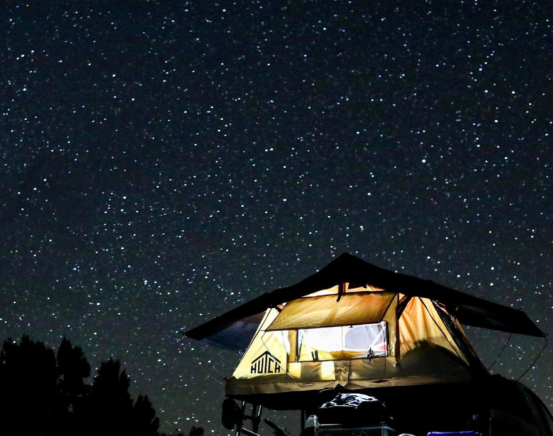 Prospector 2 roof top tent lit up at night 